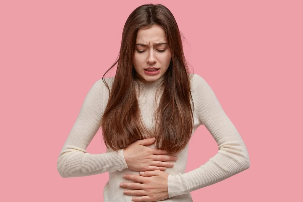 Žena s menstruačními bolestmi